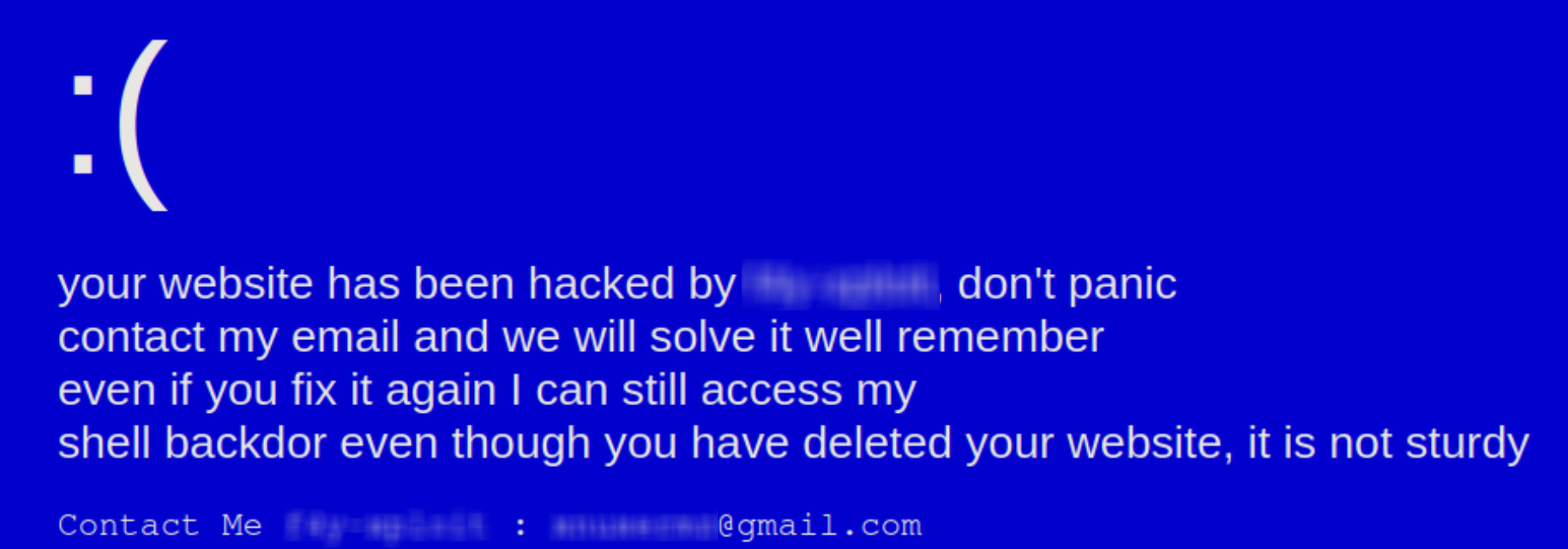 Blue screen text with website defacement